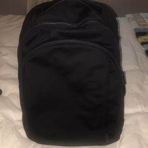 AWAY black vinyl back pack